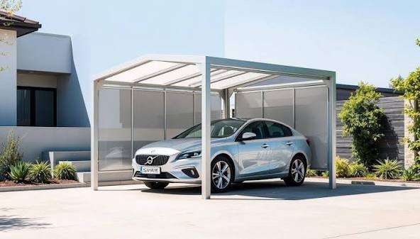 Car parked under a steel parking shed canopy